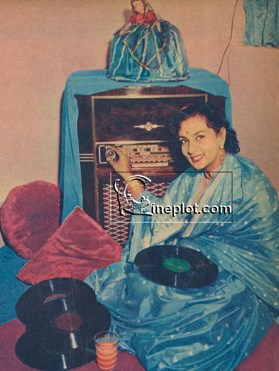Nadira tunes in to one of her favorite radio stations.